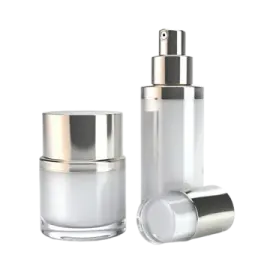 a set of three white glass bottles with silver lids