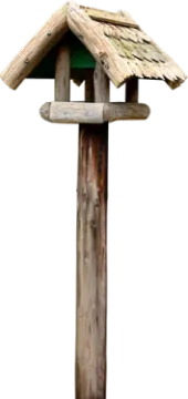 a bird house on top of a wooden pole