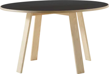a round table with black top and wooden legs