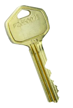 a gold key on a white background
