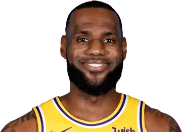 a man in a yellow jersey smiles at the camera
