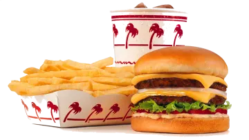 a hamburger and fries are sitting next to each other items