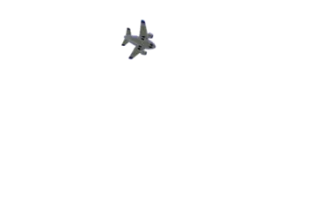 a small plane flying through the sky