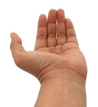 a person is holding their hand up in the air
