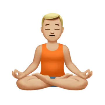 a man sitting in the middle of a yoga pose
