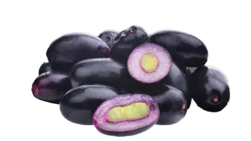 a pile of black olives on a white background