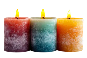 three colored candles on a white background