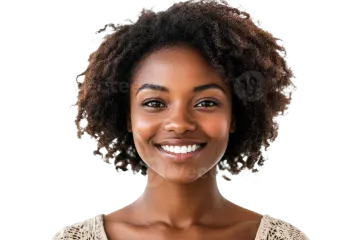 a woman with curly hair smiling at the camera