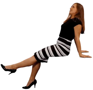 a woman is sitting on the floor with her legs crossed