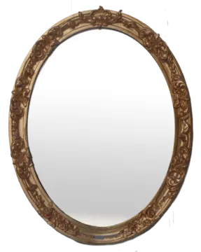 a round mirror with carvings on it
