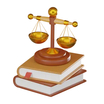the scales of justice on a book