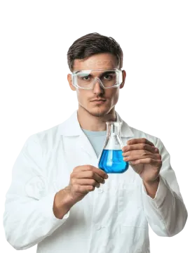 a man in white lab coat and goggles holding a test tube