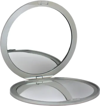 a silver compact mirror on a white background