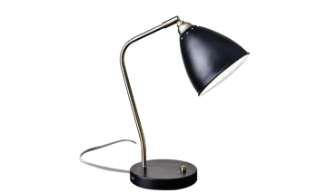 a black desk lamp on a white background
