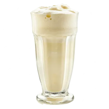 a glass filled with milk on a white background