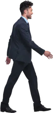 a man in a suit and tie is walking