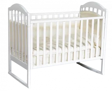 a baby cribt with white sheets and pillows