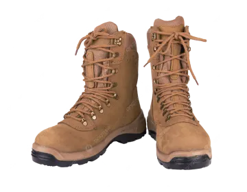 a pair of brown boots on a white background