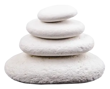 a stack of white rocks on a white background