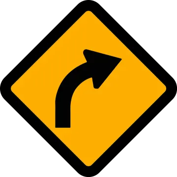 a yellow and black road sign with an arrow