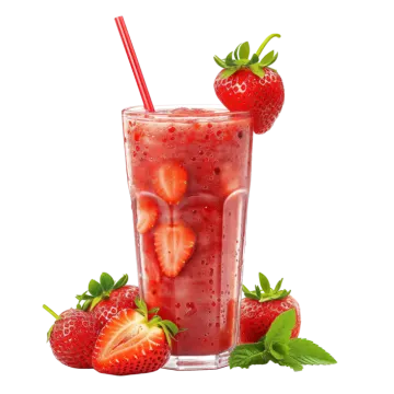 a glass of strawberry juice with strawberries on the side