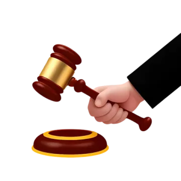 a judge's hand holding a gavette