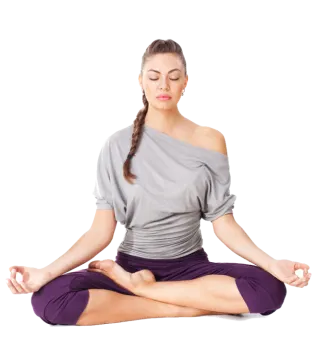 a woman sitting in a lotus pose with her eyes closed