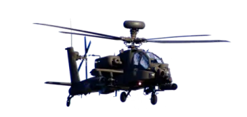 a military helicopter flying in the sky