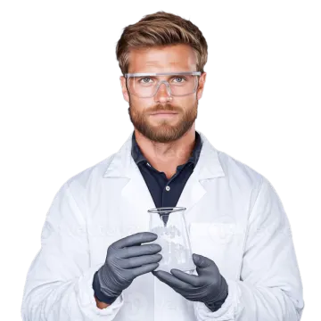 a man in white lab coat holding a test tube