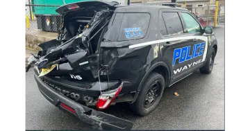 a police car that has been involved in an accident