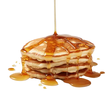 a stack of pancakes with syrup on top