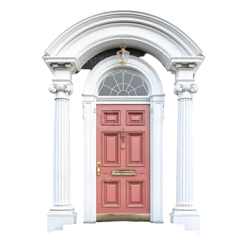 a red door in front of a white house
