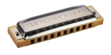 a harmonica on a white background