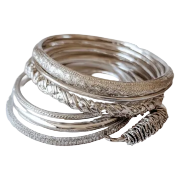 a stack of silver bang bracelets