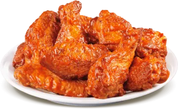 a plate of chicken wings on a white background