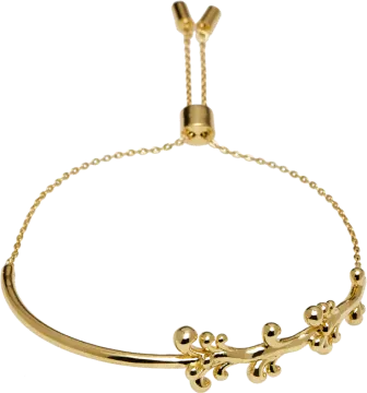 a gold bracelet with flowers on it