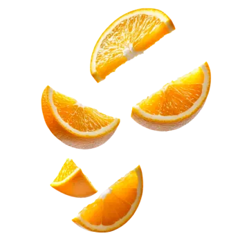 a group of oranges falling into the air