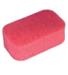 a pink sponge on a white background