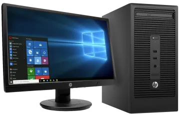 a desktop computer sitting next to a monitor