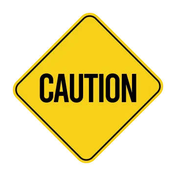 a yellow caution sign that says caution