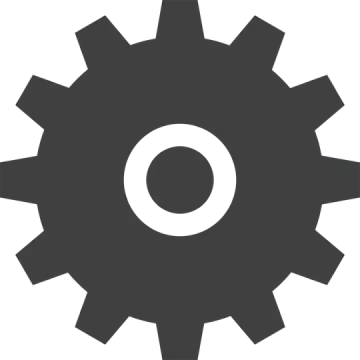 a black and white image of a gear