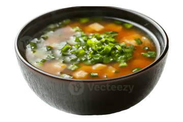 a bowl of soup on a white background