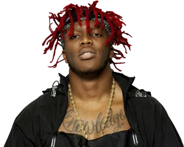 a man with red dread hair wearing a black jacket