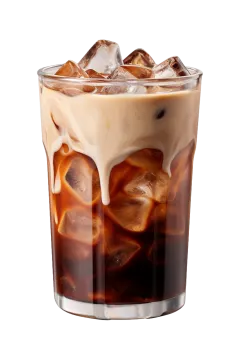 a glass of iced coffee with ice on top