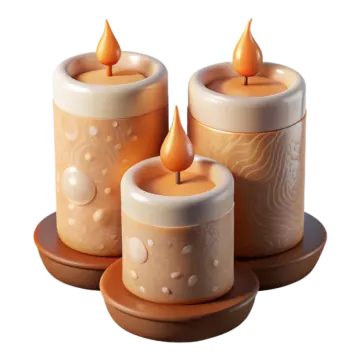 three candles sitting on top of each other candles