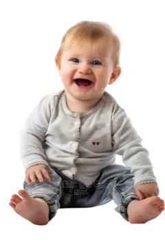 a baby sitting on the floor with his mouth open