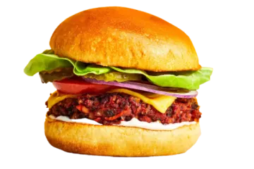 a hamburger with meat and vegetables on it