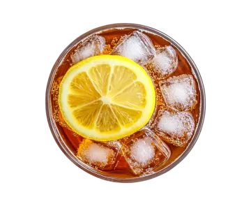 a glass filled with ice and a lemon slice
