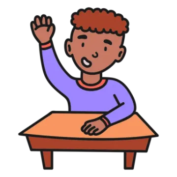 a boy sitting at a desk raising his hand