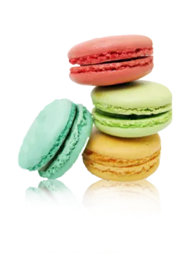 a stack of colorful macaros on a white background